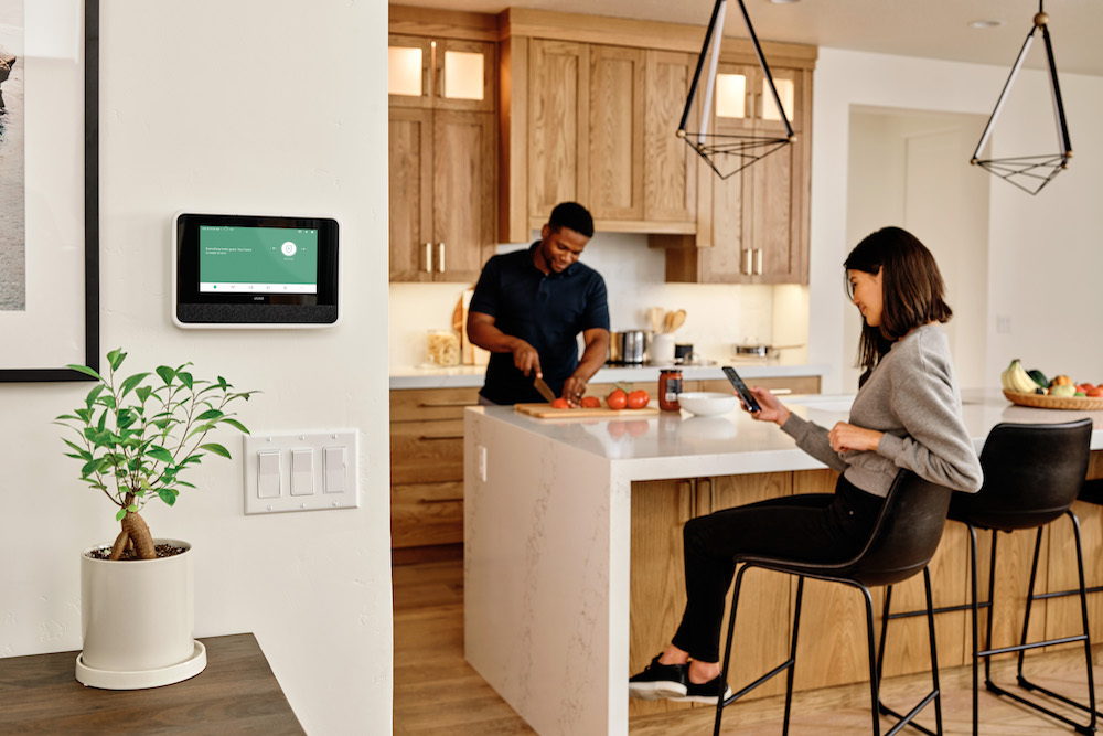 Couple enjoying their Vivint system.