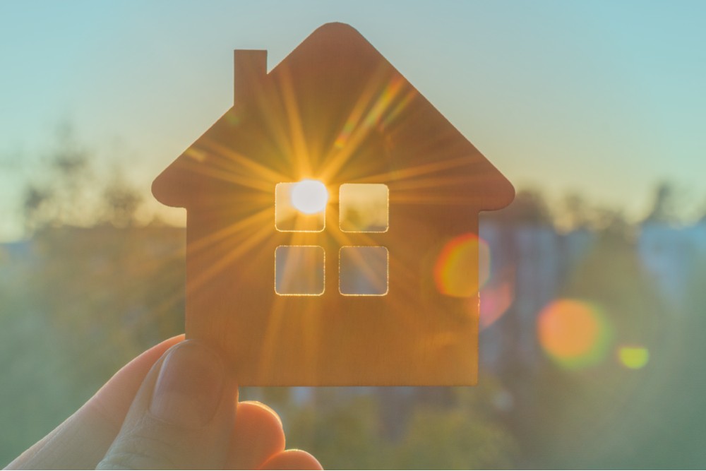 A house backlit by the sun.