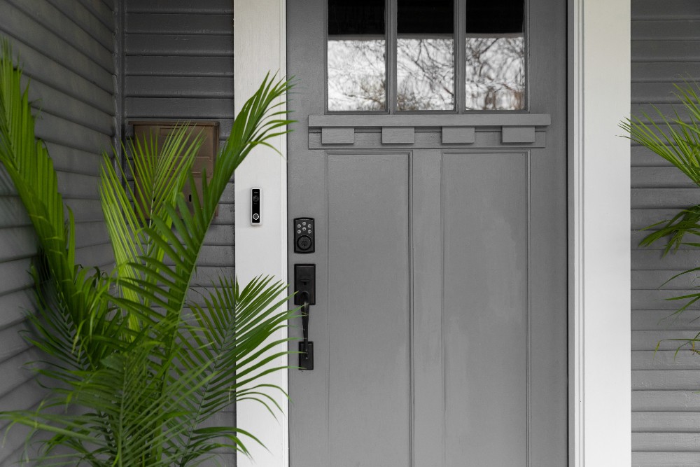 Front door protected by a Vivint Doorbell Camera Pro and Vivint Smart Lock.