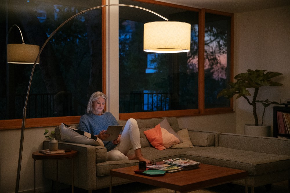 Woman watching a show on her tablet.