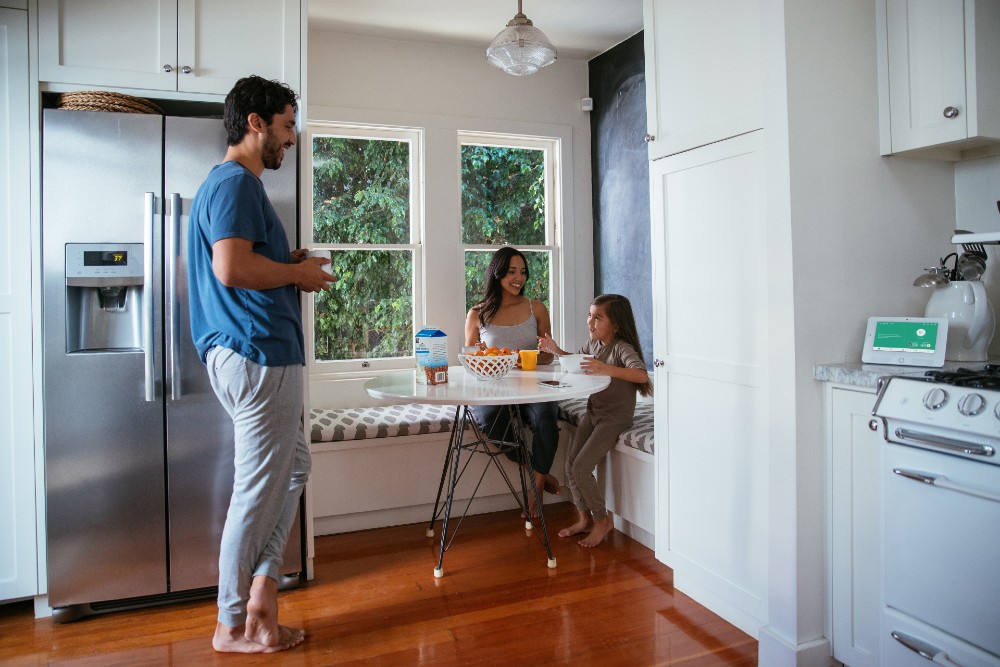 Family having breakfast in their kitchen.