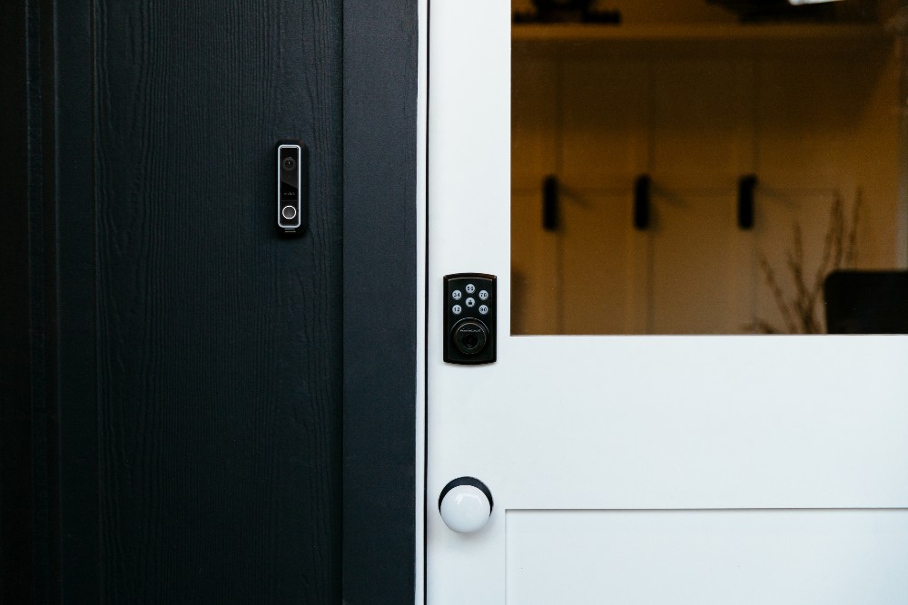View of a front door that has Vivint Smart Lock and Doorbell Camera Pro