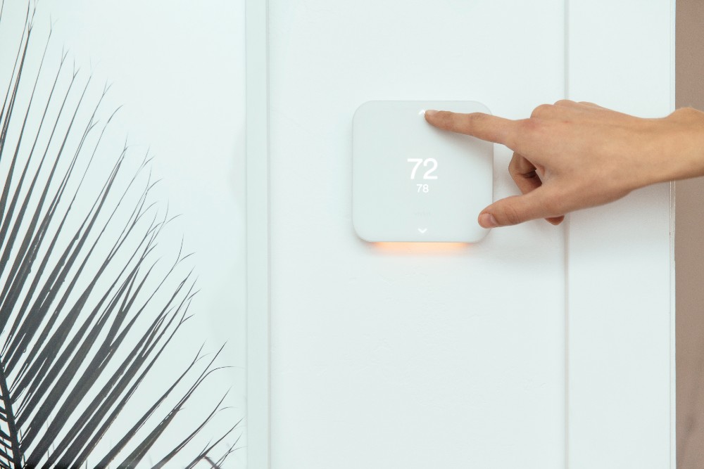 Vivint Smart Thermostat on a wall.