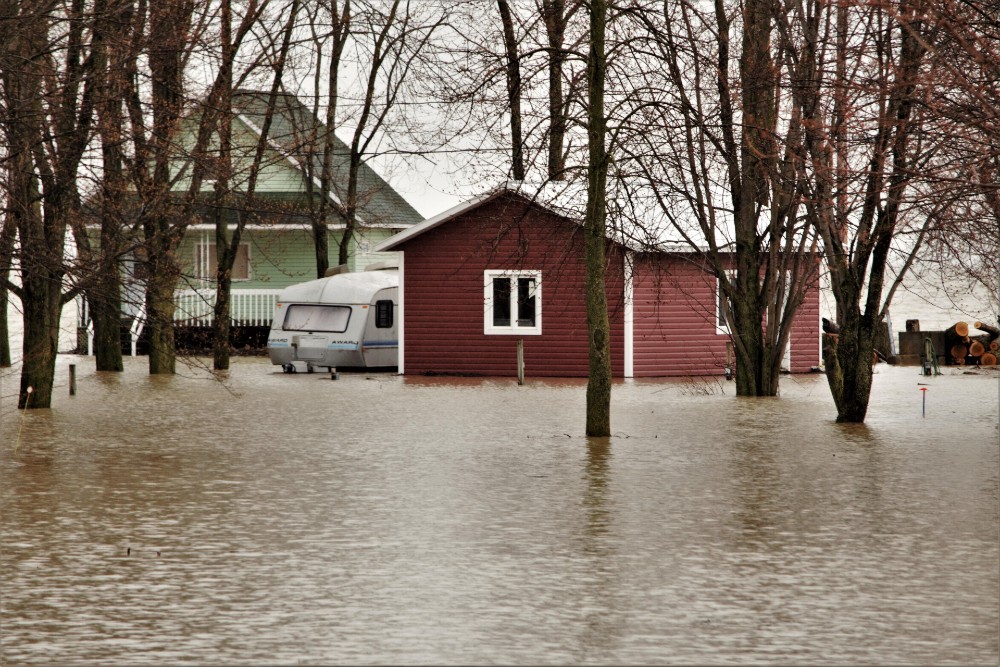 Home submerged in water from a flood.
