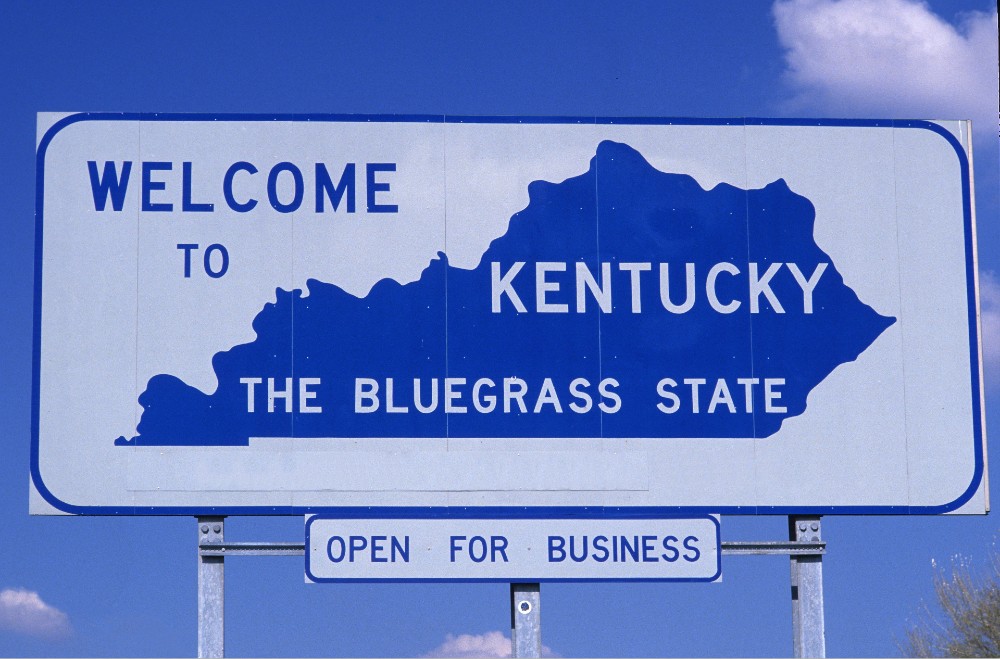 Kentucky state sign on the side of the road.