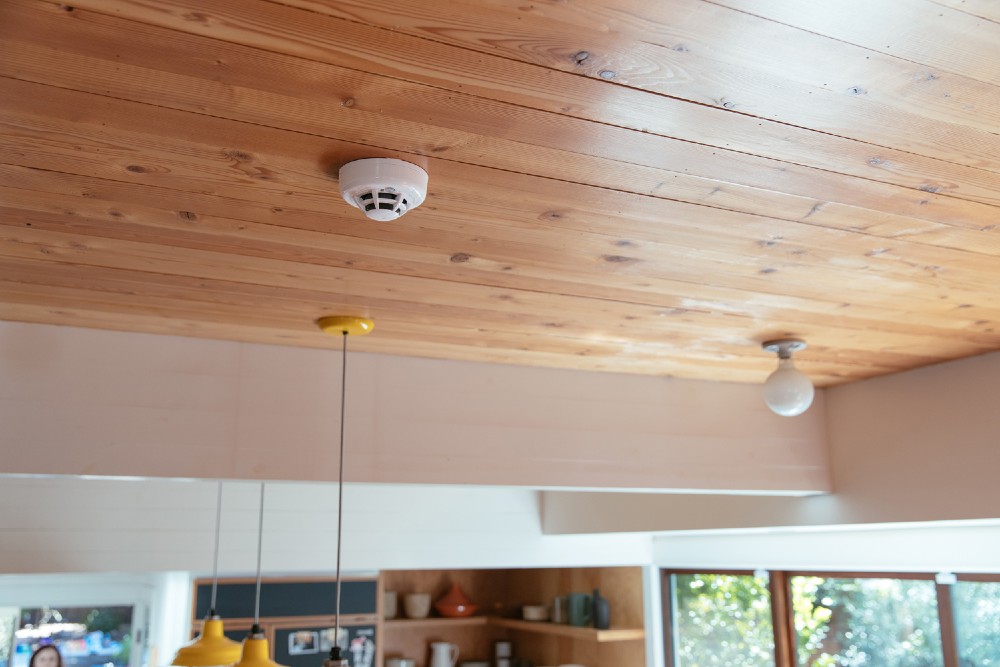 Smoke detector on the ceiling.