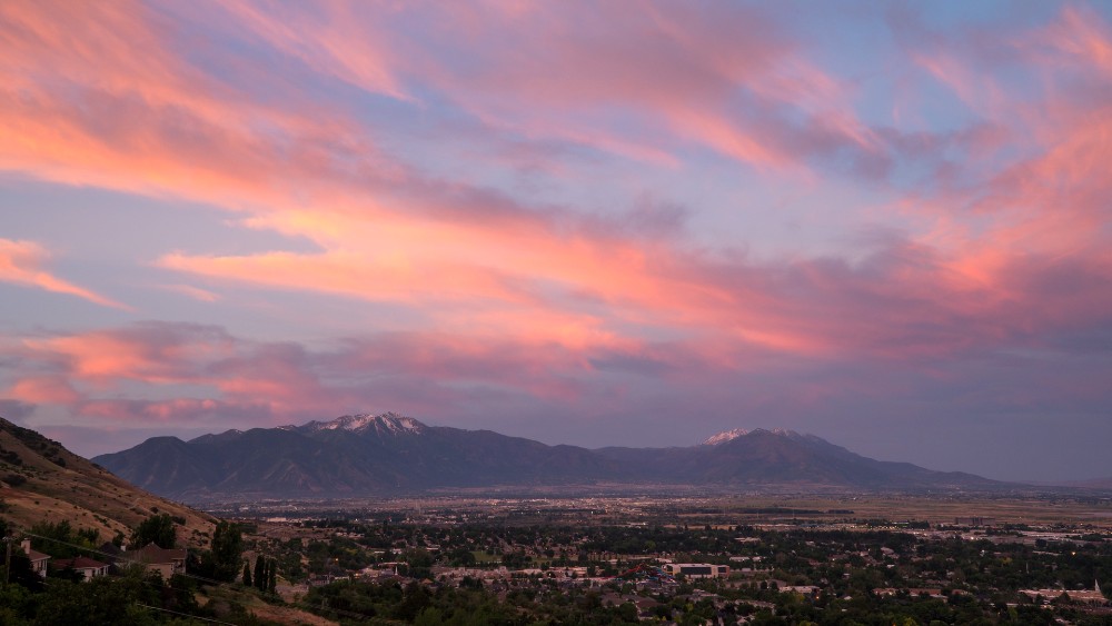 Sunrise looking over Provo towards Spanish Fork across valley