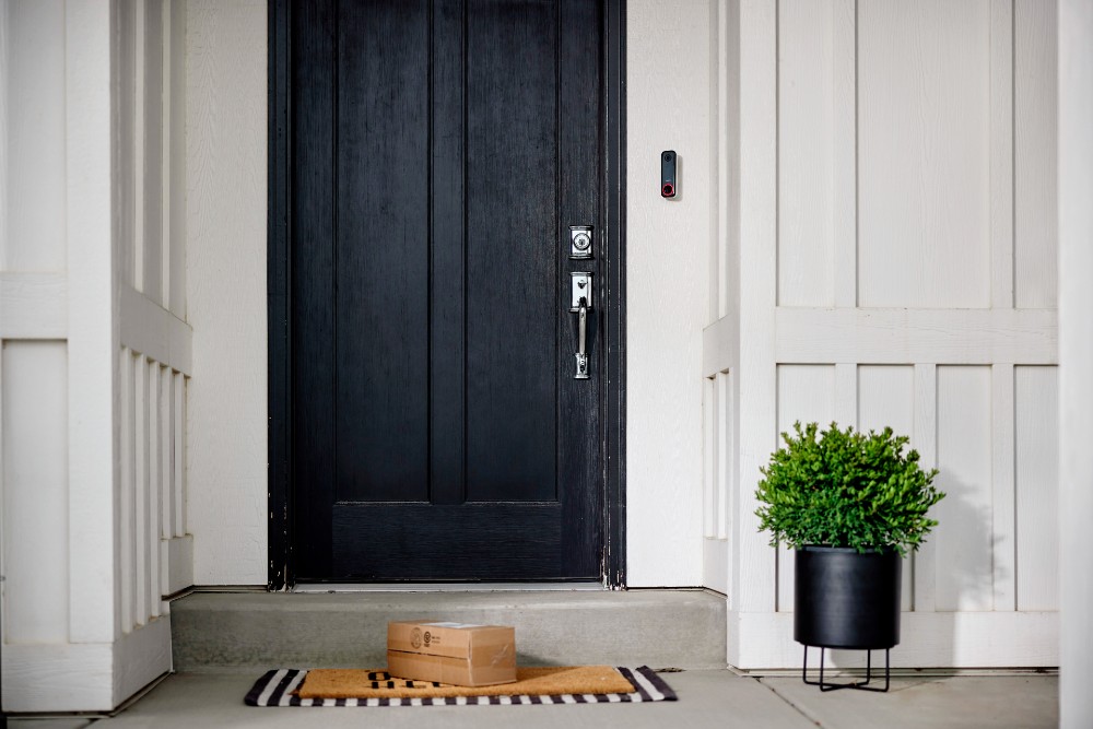 Package on a porch protected by the Vivint Doorbell Camera Pro.