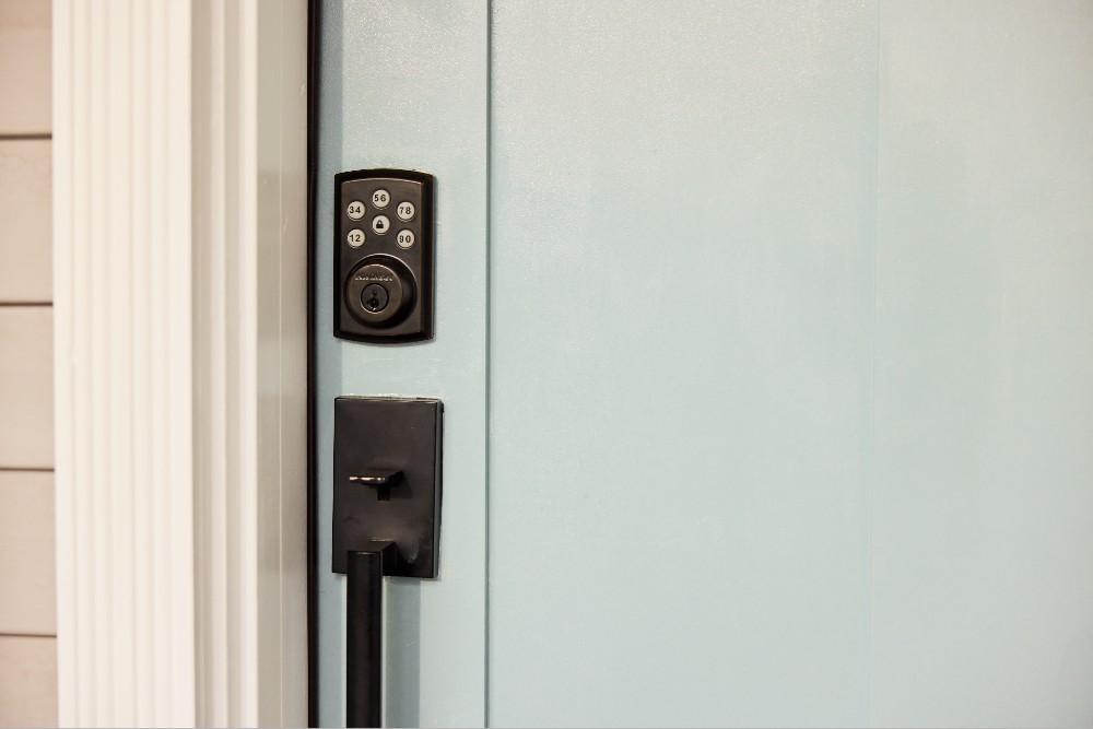 Smart door lock on a front door.