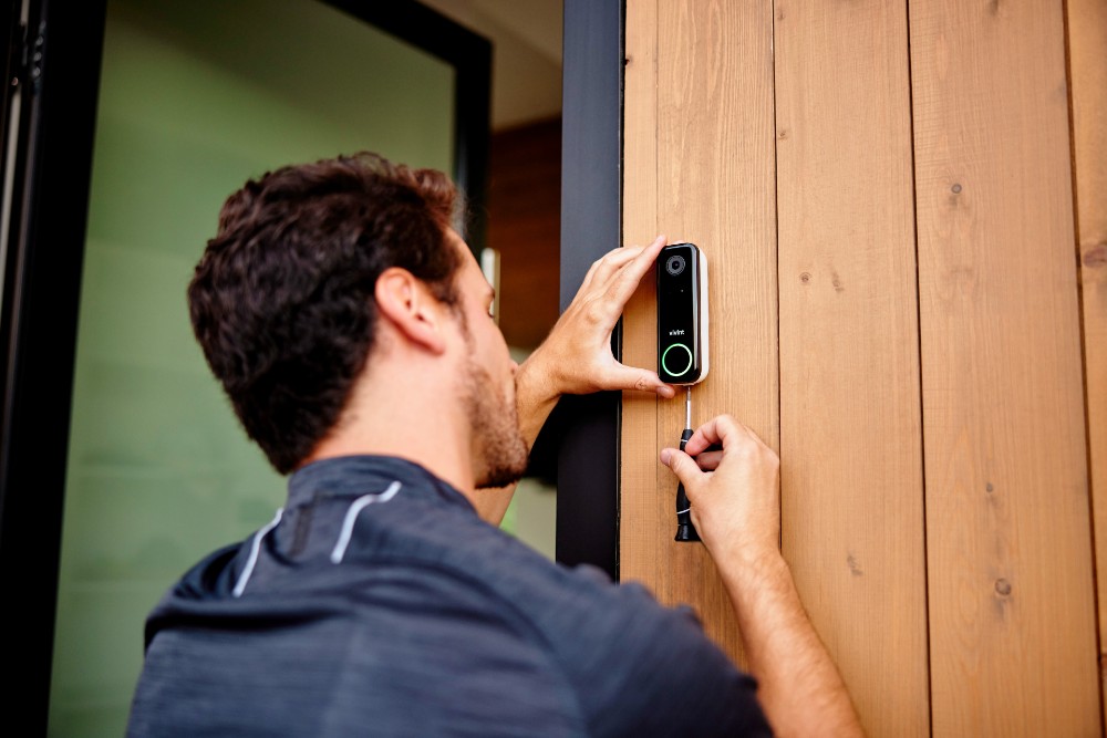 Vivint tech installing the Vivint Doorbell Camera Pro.