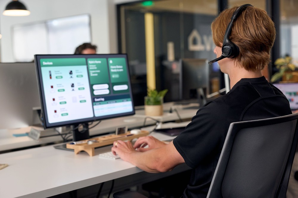 Vivint monitoring professional in a call center.