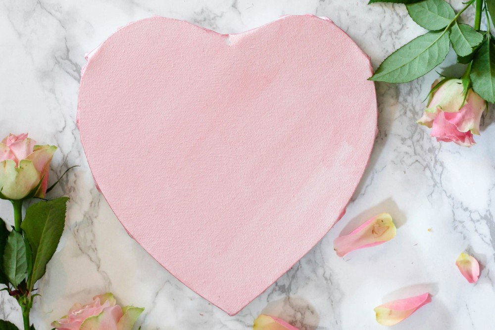 Pink heart on a table.