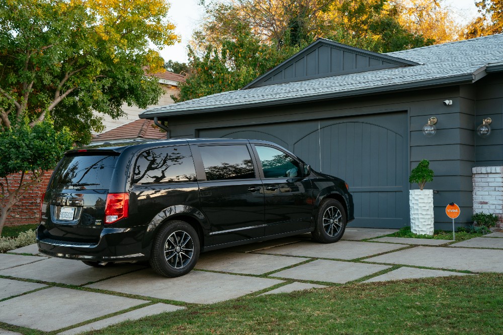 Car parked in front of a home.