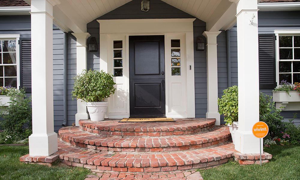 front door with Vivint doorbell camera