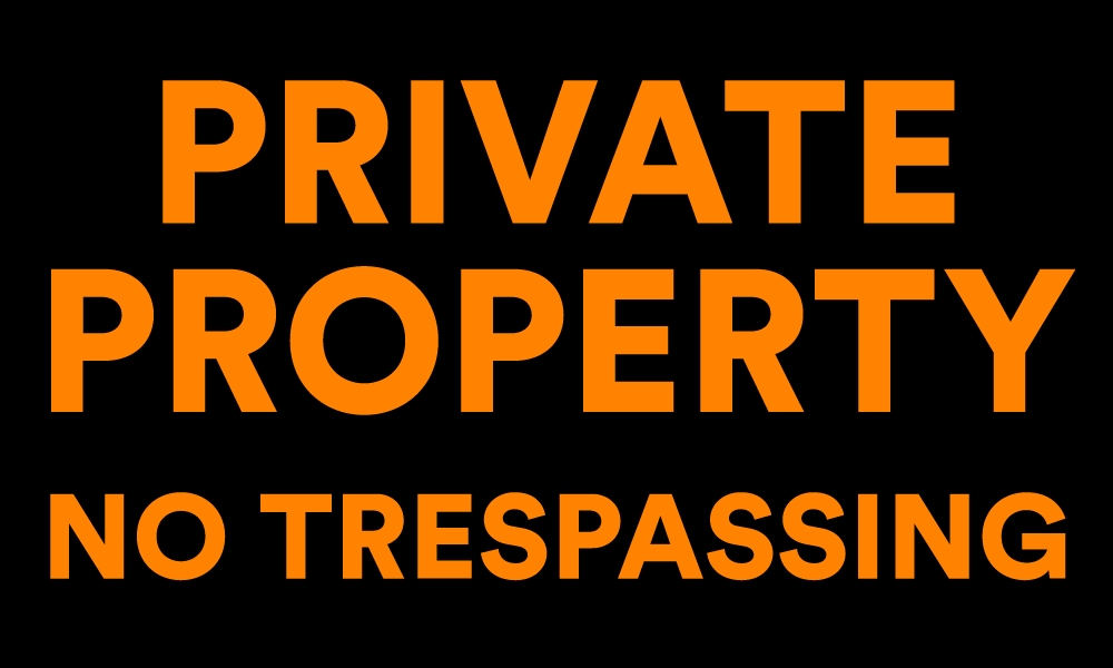 Private property and no trespassing signs help with home security