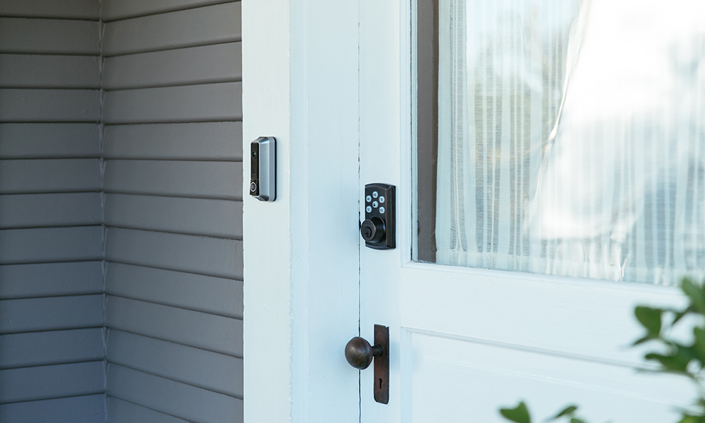 Front door scene showing Vivint Smart Lock and Doorbell camera