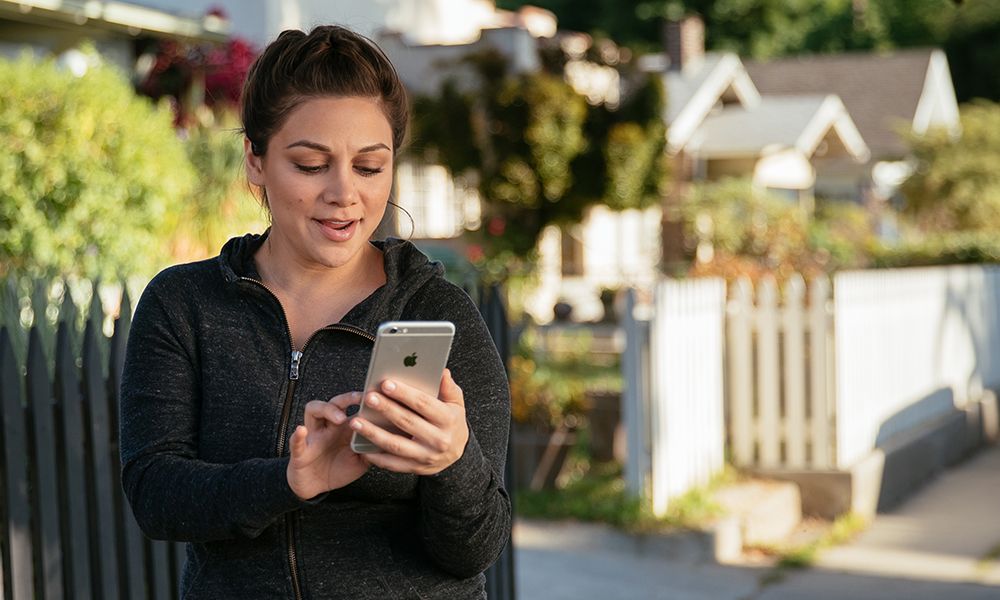 Vivint smart home app woman walking