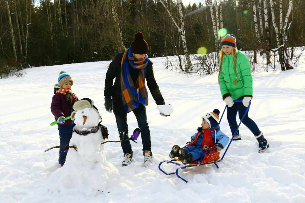 family snowman mountains