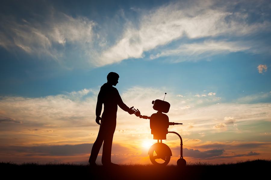 Sunset pic of a person and a robot