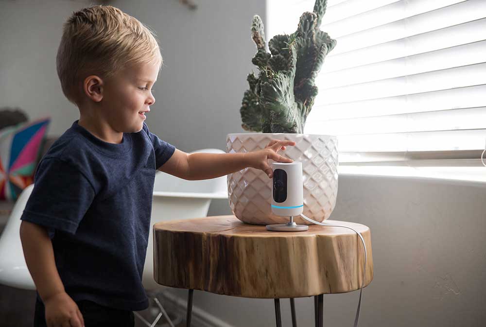 Child using a Vivint Indoor Camera