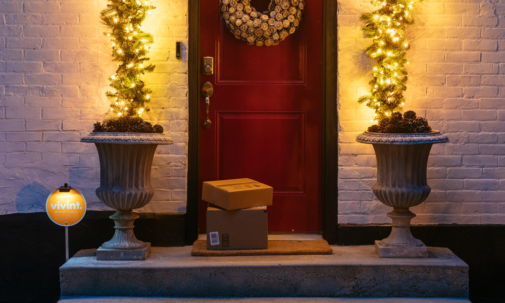 Vivint smart home doorbell camera with packages on the doorstep