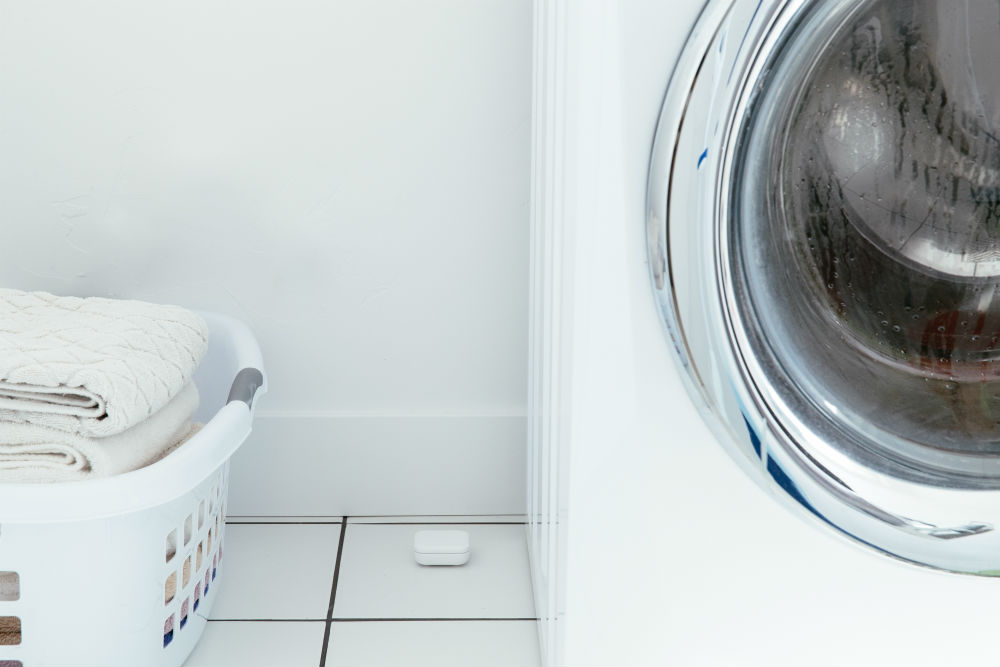 Washing machine and laundry with a Vivint water sensor