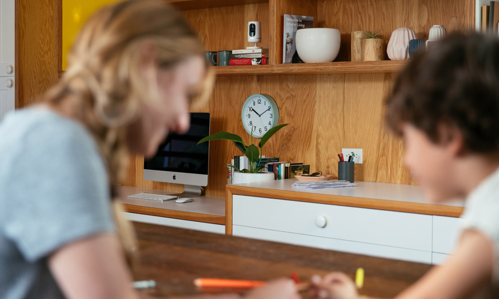 Vivint Indoor Camera with mother and son drawing