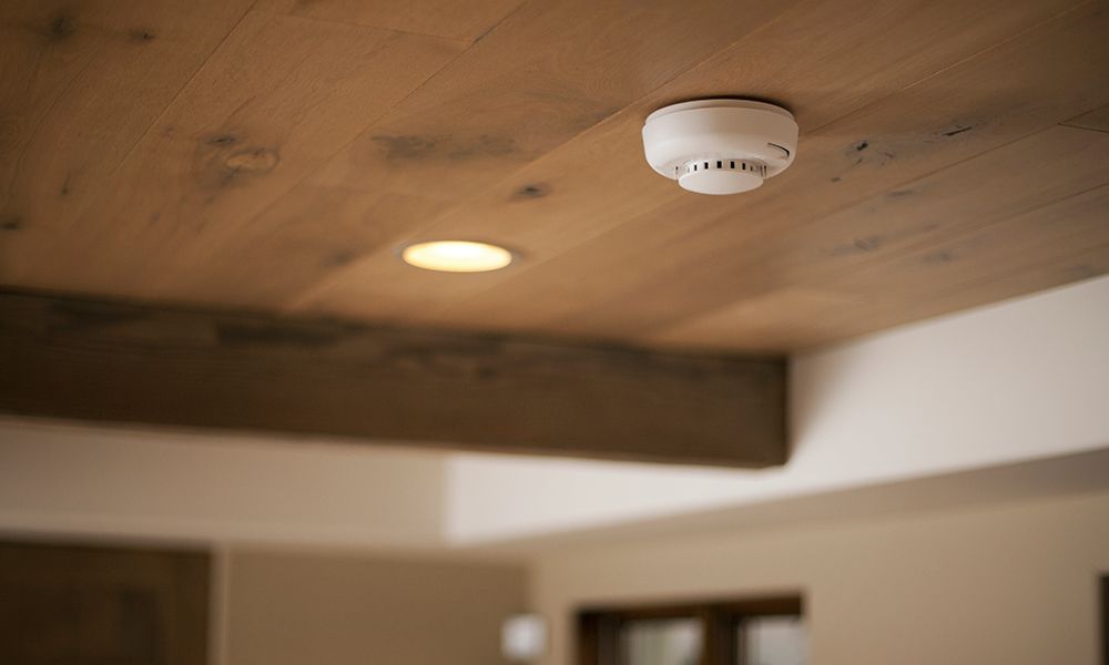 Smoke detector on a wood ceiling