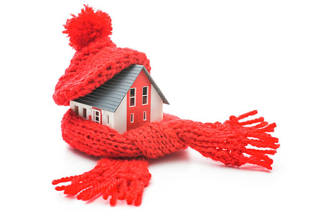 Fake house with a scarf and hat