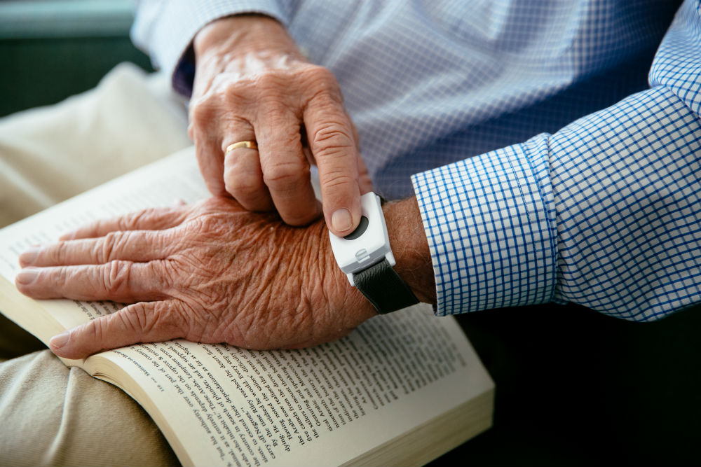 Vivint Emergency Pendant being used by an older gentleman. 