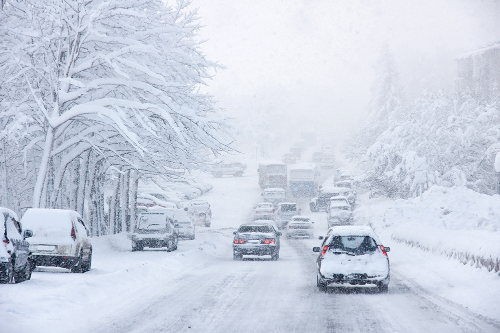 Cars on a road during a winter storm